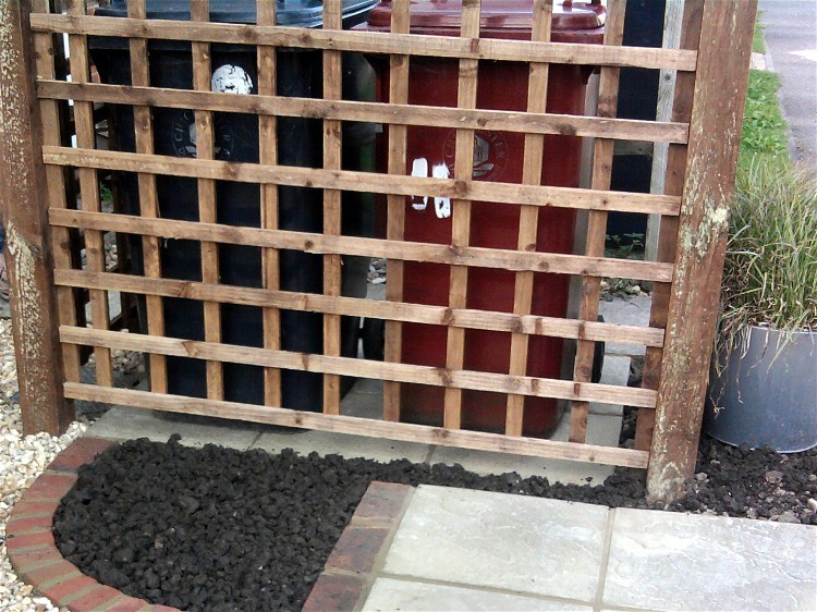 Trellis wheely bin screen ready for planting. Vital Plants